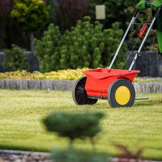 A person pushing a lawn mower

AI-generated content may be incorrect.